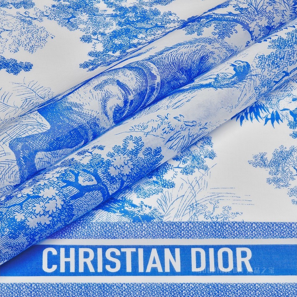 Dior 印花纱笼 象牙色和荧光蓝色棉质面料 Sauvage 茹伊印花