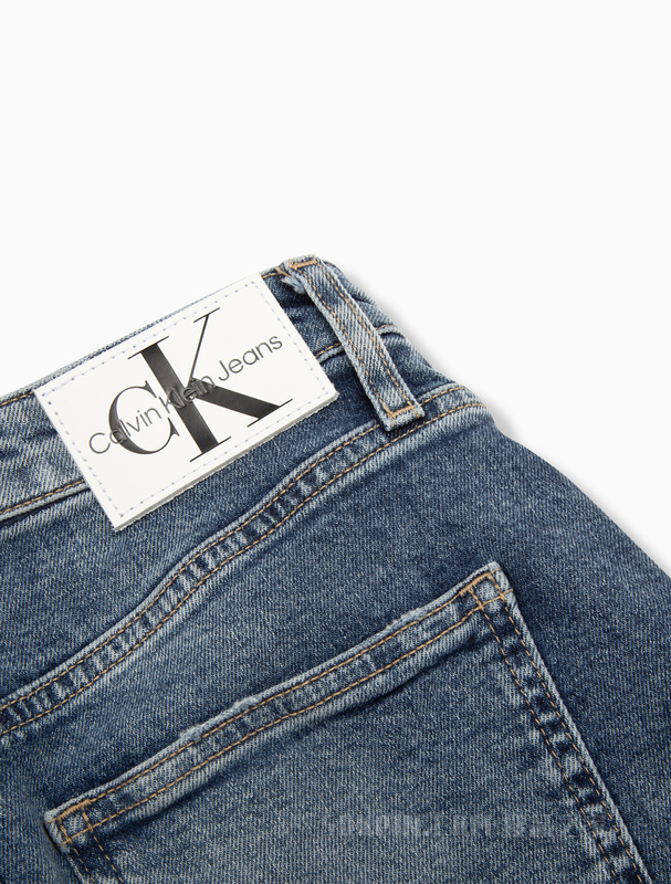 Calvin Klein 22春夏女士休闲铆钉扣LOGO贴片高腰A字牛仔短裙J218474