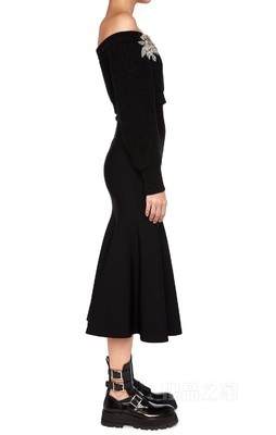 Black knitted dress with embroidered shoulder motif